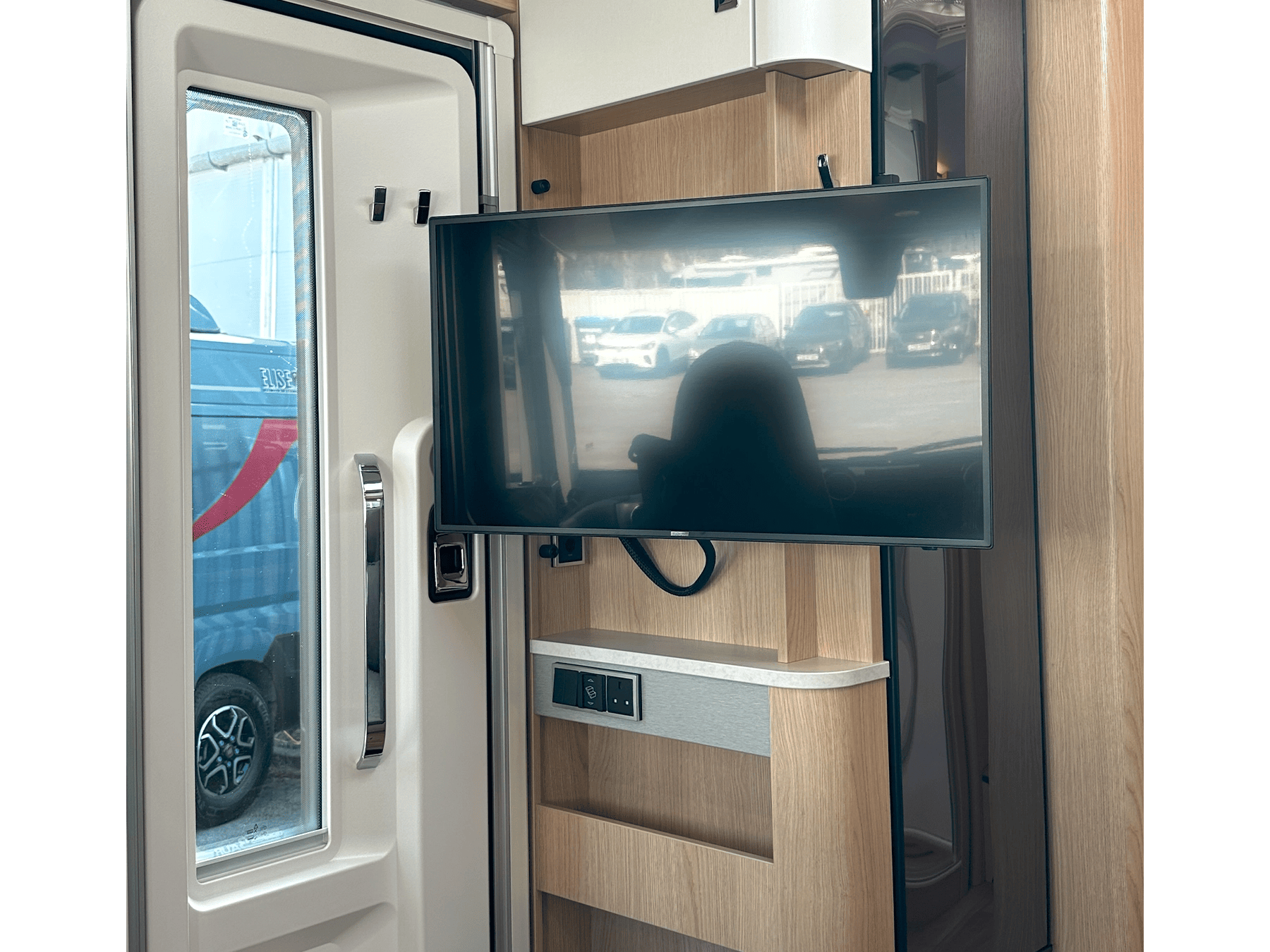Hymer B-MC I 680 Motorhome TV in Lounge